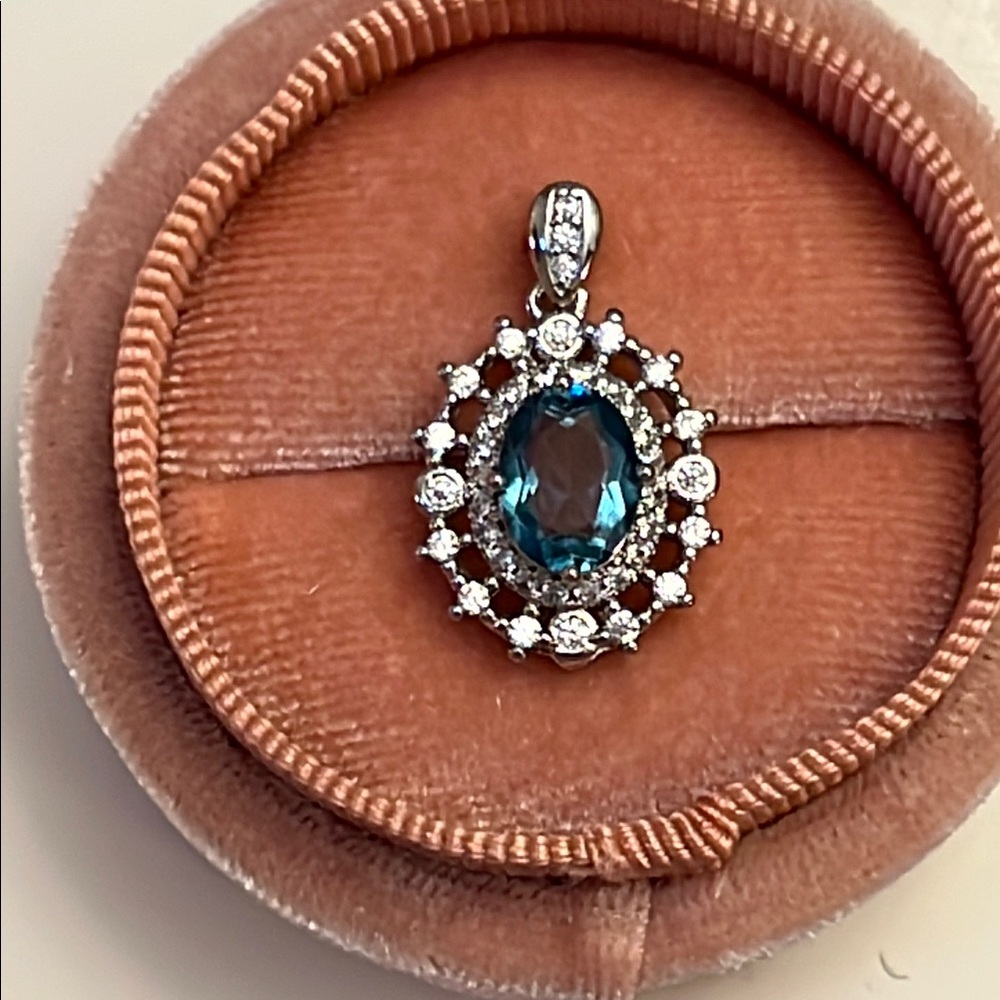 Elegant Blue Topaz and Silver Pendant Necklace